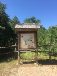 Trailhead marker for the Inga Trail on the Bull Creek District Park.